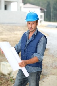 Building Surveyor on site checking drawings Building Surveyor on site checking drawings